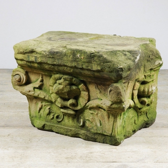 Antique hand carved sandstone corbel with acanthus leaf and urn decorations to each side.