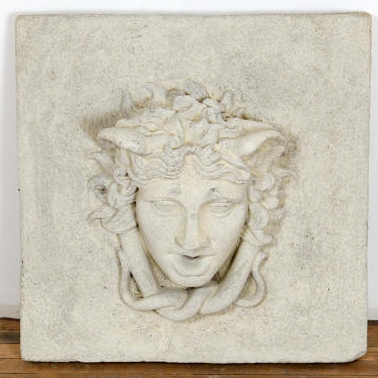 Reclaimed composite stone fountain head depicting a faun